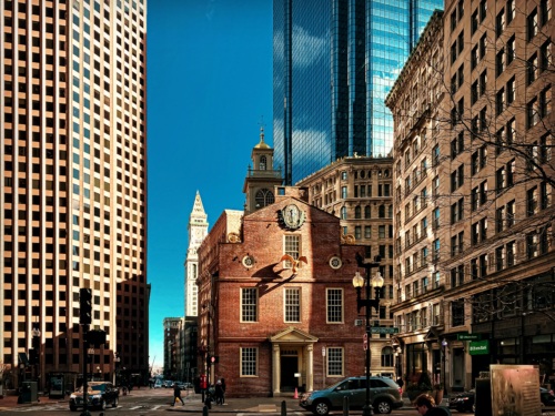 Photo of downtown Boston, juxtaposing colonial era building with modern skyscrapers